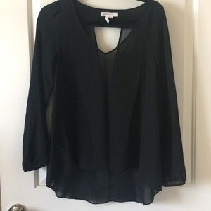 BCBG flowy top with open back